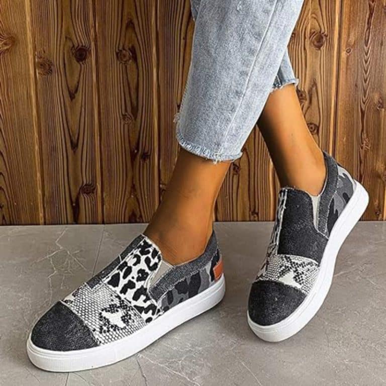 Comfortable canvas sneakers for women with gray snake print and black canvas accents.
