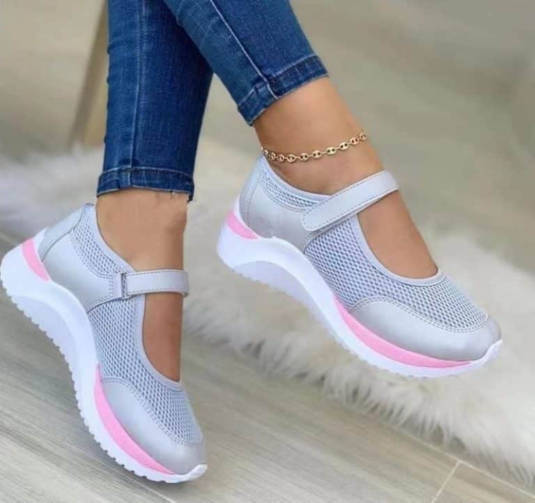 Orthopedic shoes for women in light mesh, grey color with pink details and Velcro closure.