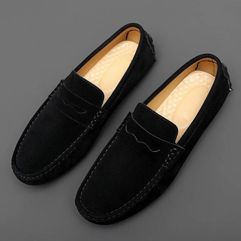 Orthopedic shoes for men in black on a gray background.