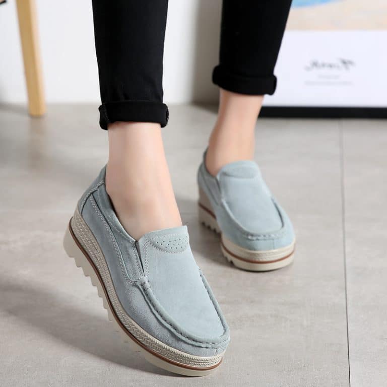 Sky blue suede platform moccasins for women, front view, with embossed sole.