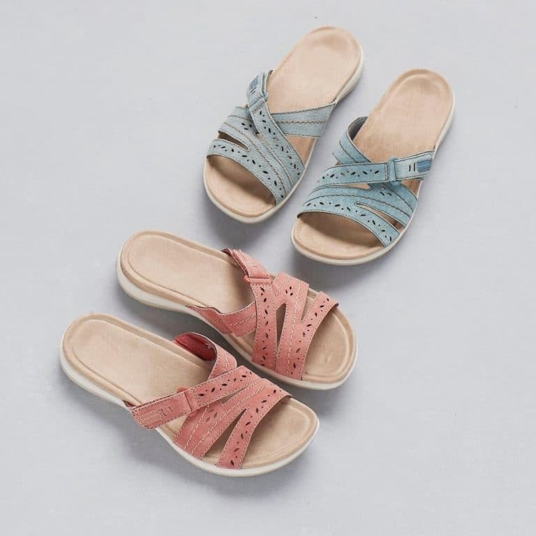 Pair of comfort sandals in blue and pink leather with adjustable straps for women.