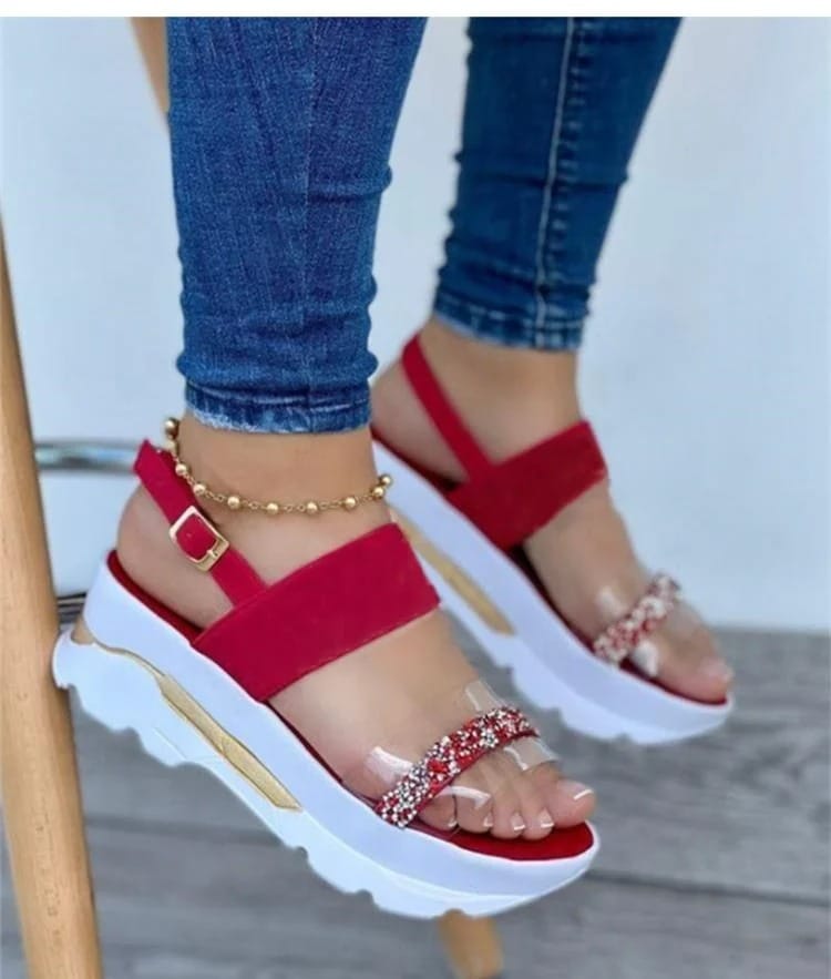 Sandals with arch support in red, featuring straps and red and white rhinestone embellishments.