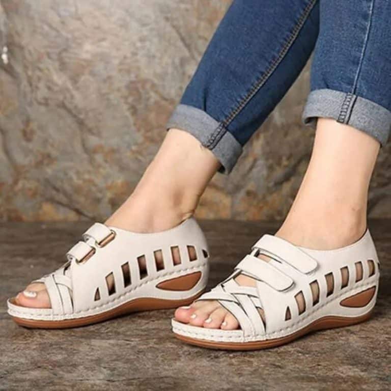 Summer orthopedic sandals for women in beige with straps and cutouts.