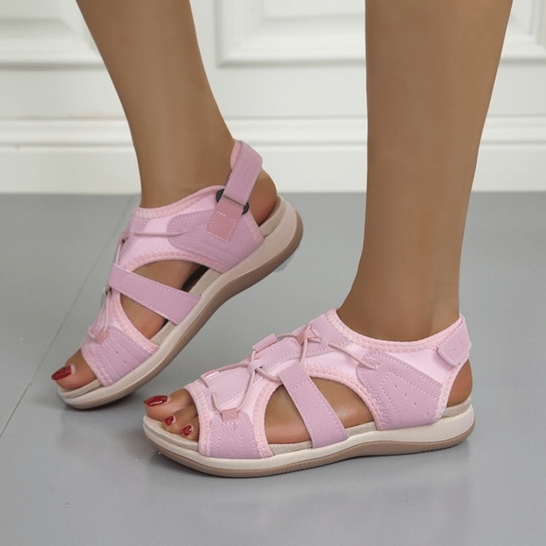 Pink orthopedic sandals for women with Velcro closure, comfortable and stylish, ideal for walking and relaxation.