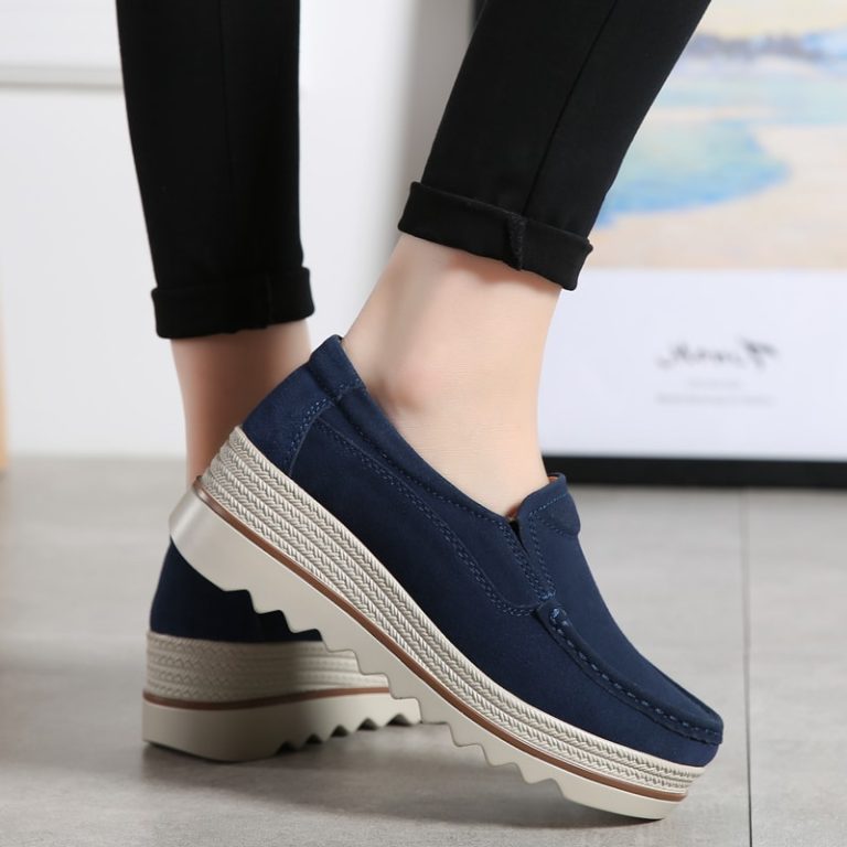 Side view of navy blue suede women's loafers, showing the platform sole and the comfortable shape.