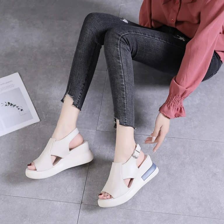 Close-up of beige wedge sandals with a thick sole