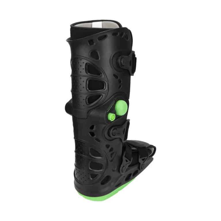 Black orthopedic walking boot with inflation system.