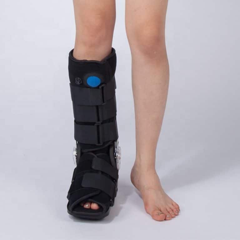 Medical black adjustable boot with inflatable sections and angle control.