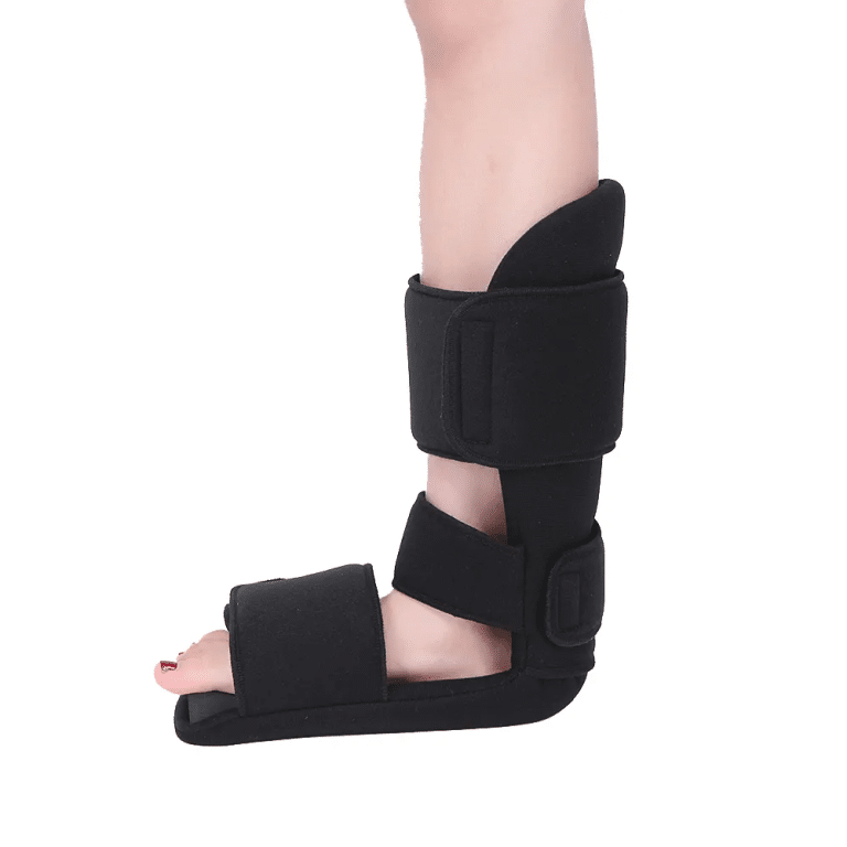 Black orthopedic boot for right foot support, with velcro straps.