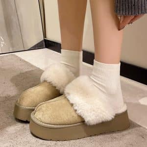 Women's fur-lined slippers with orthopedic soles, beige color with white fur.