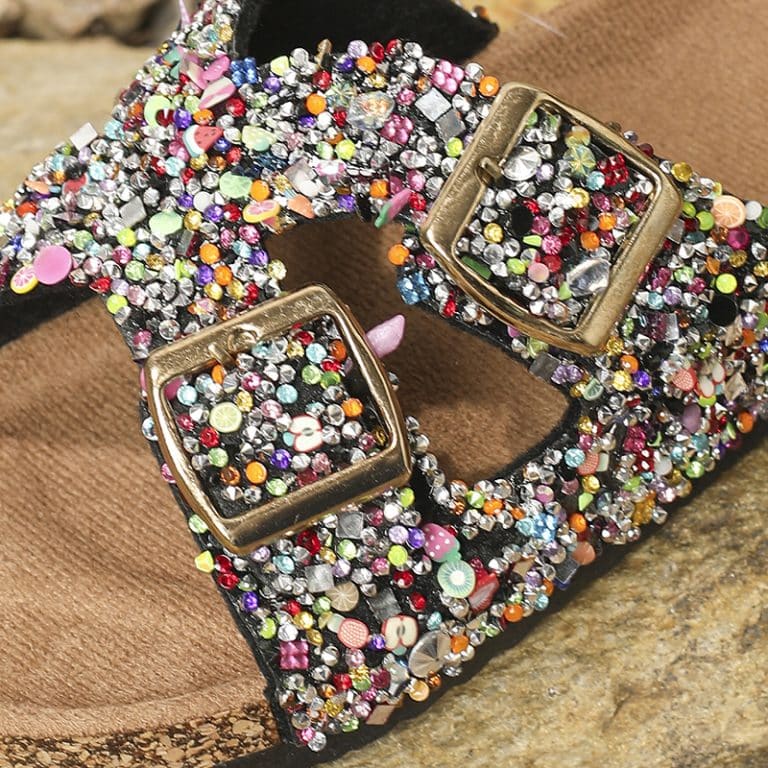 Orthopedic glitter slides for women, with two metal buckles and a multitude of colorful stones.