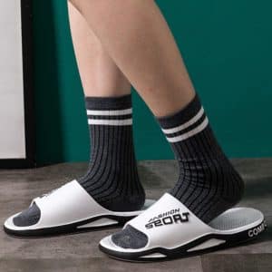 Lightweight orthopedic slides for men in white.