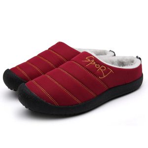 Pair of red slippers with horizontal stripes and gold embroidery, lined with white faux fur.