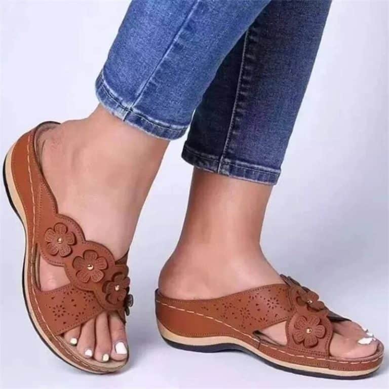 Brown orthopedic sandals for women with embossed floral patterns and comfortable insole.