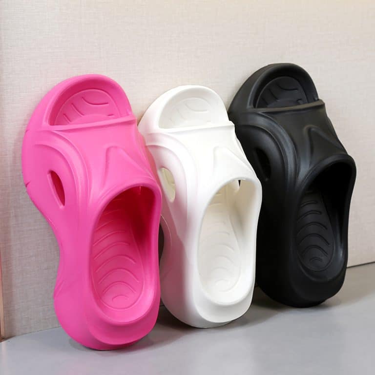 Orthopedic tap trio for flat feet women in pink, white, and black lined up against a beige wall background.