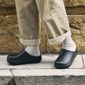 Medical orthopaedic slippers with non-slip sole in black.